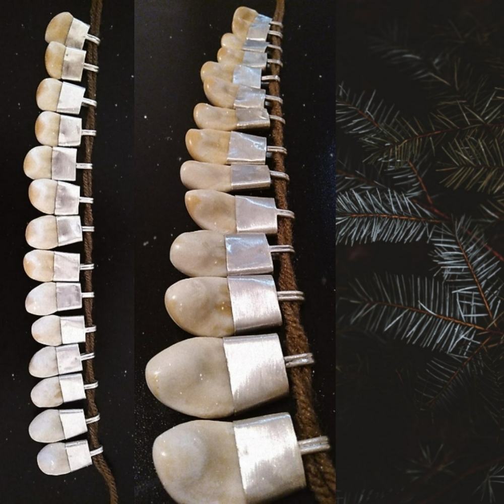 Elk ivory pendants